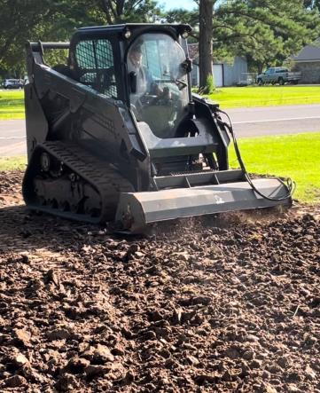 Caterpillar 259D skid steer front view